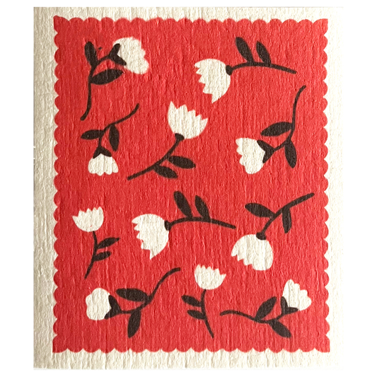 White swedish cloth with a red background and white and black flowers